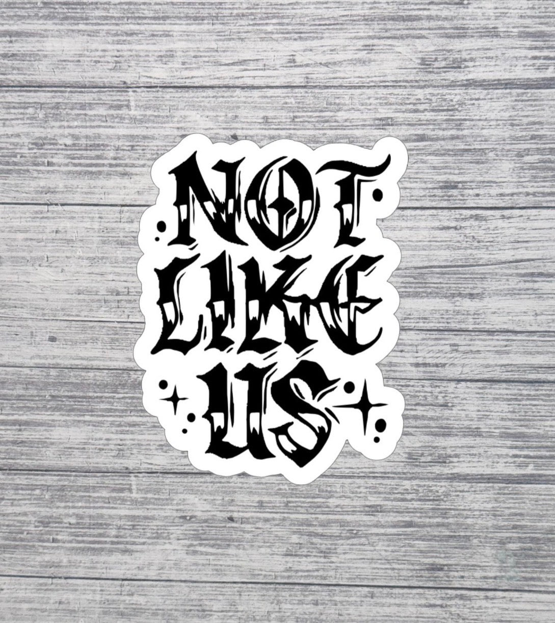 Not Like Us Gothic Lettering Sticker – Black & White Aesthetic Sticker – 3” Waterproof